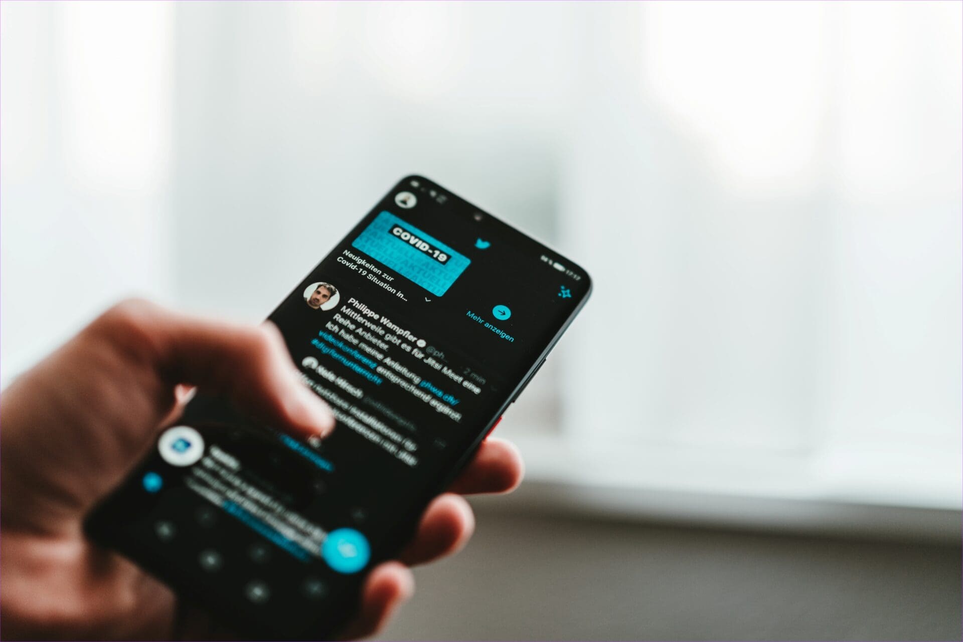 Twitter Being Used on a Phone