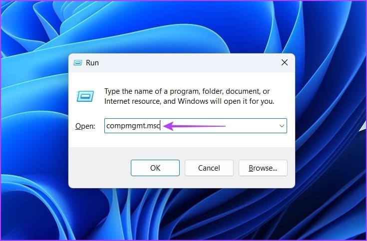 Typing compmgmt.msc command in Run tool